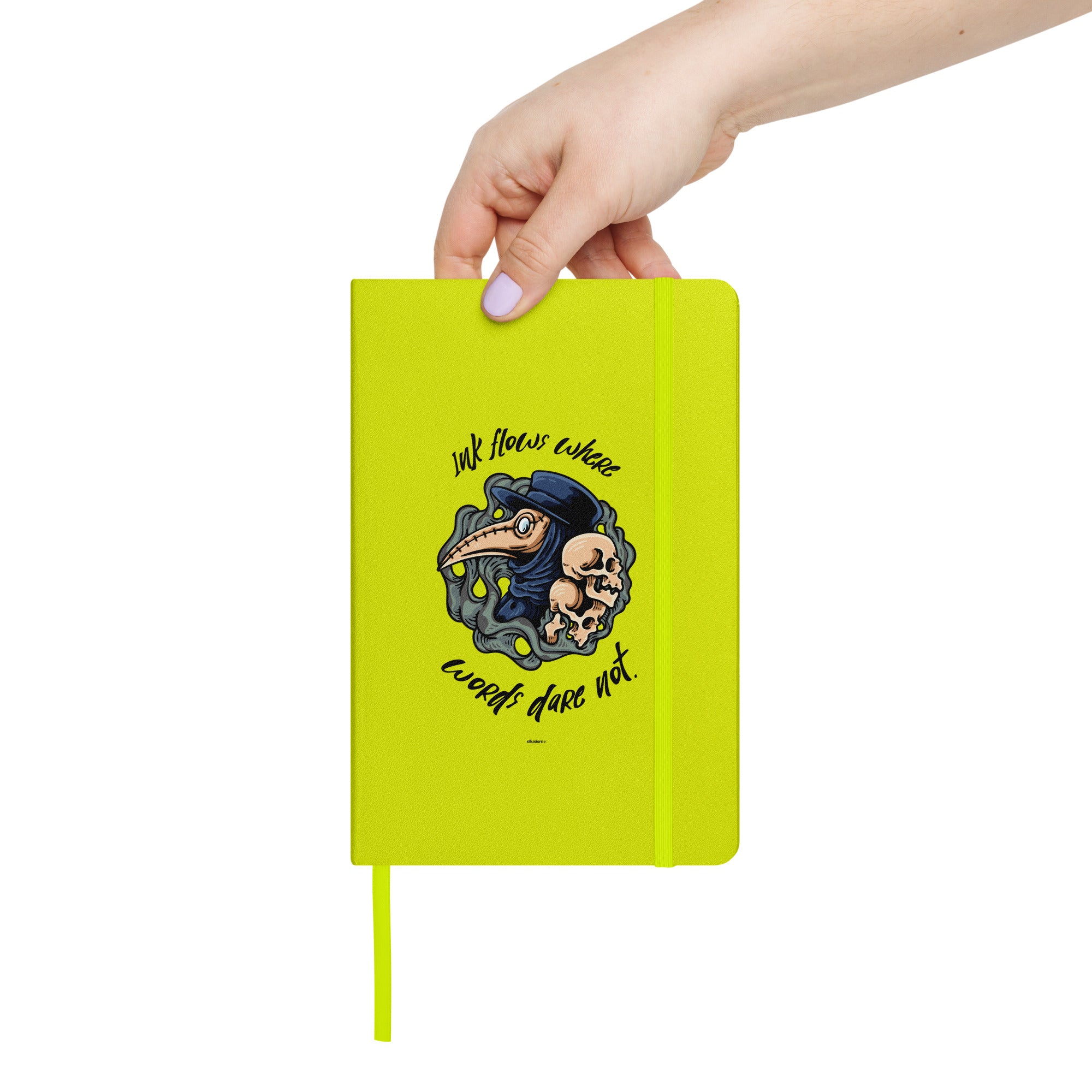 Hand holding the lime green 'Ink Flows Where Words Dare Not' Hardcover JournalBook® featuring a bold plague doctor design.