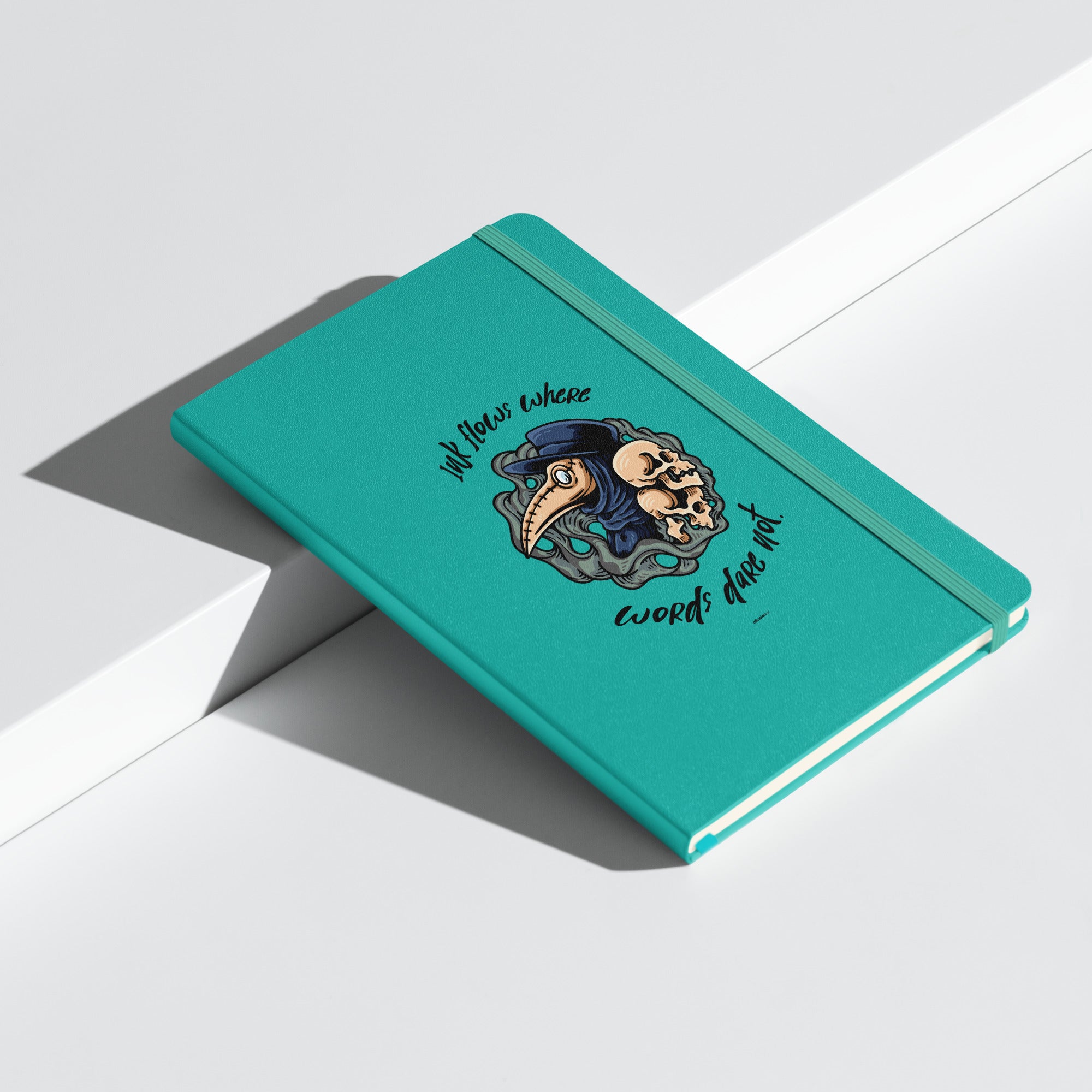 Turquoise edition of the 'Ink Flows Where Words Dare Not' Hardcover JournalBook®, showcasing a bold plague doctor design and vibrant color palette.