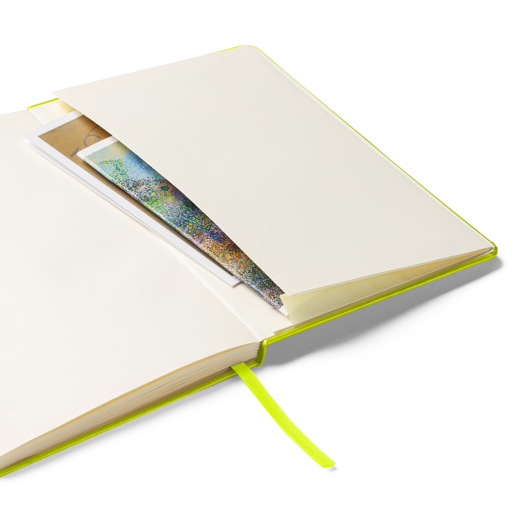 Expandable pocket inside the lime green hardcover notebook.