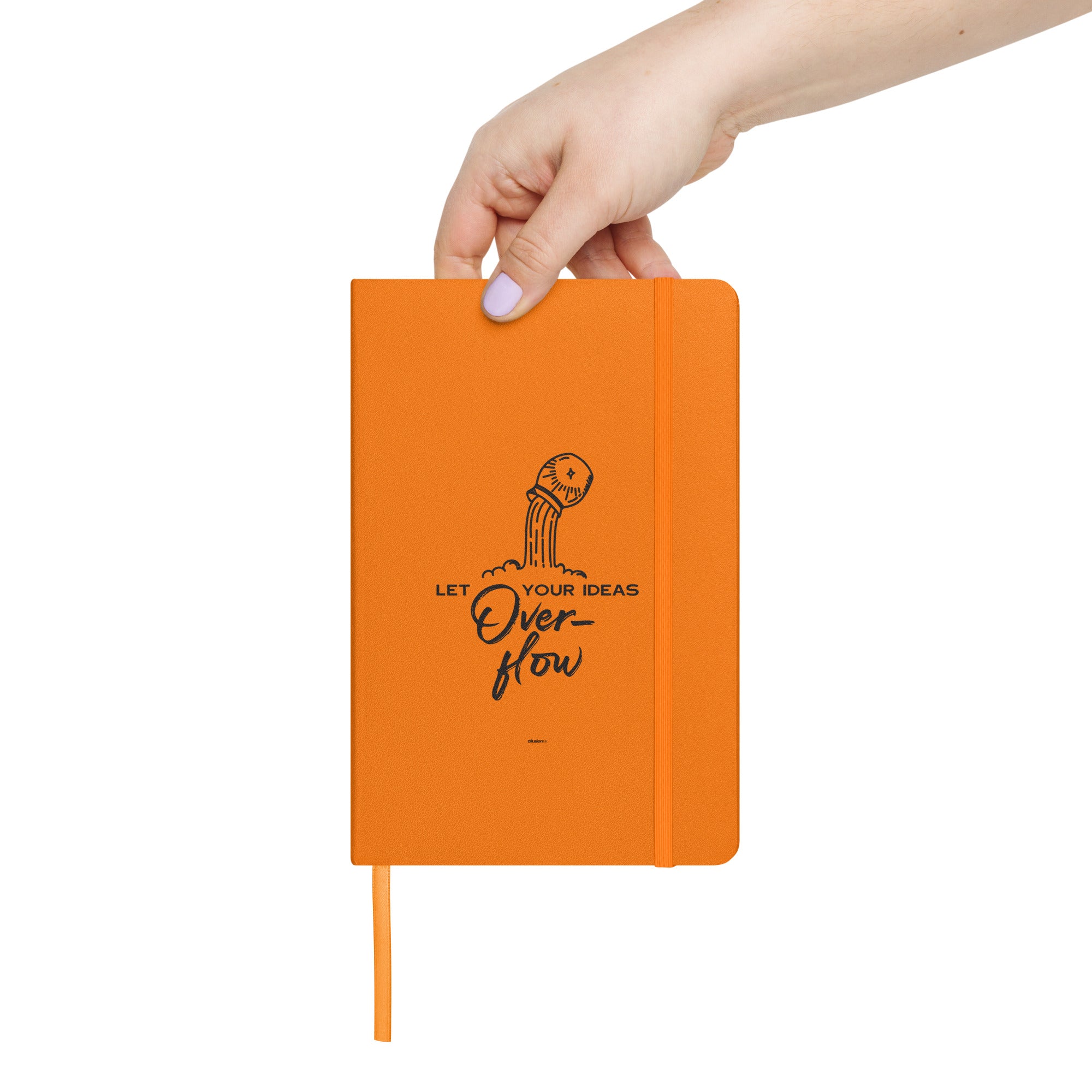 Hand holding orange hardcover notebook with 'Let Your Ideas Overflow' design.