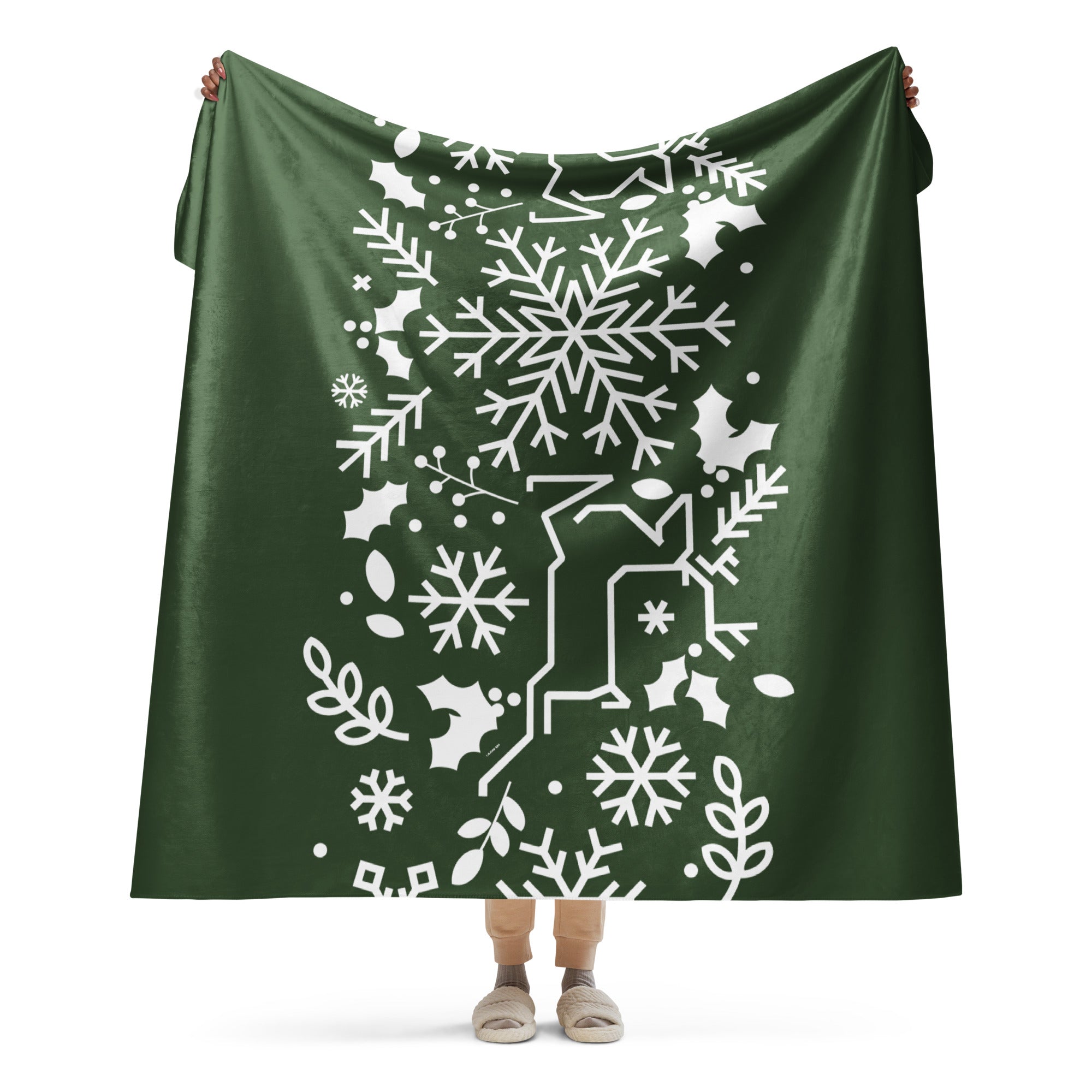 Forest Green Sherpa Blanket largest size on full display, highlighting its festive snowflake design and luxurious sherpa lining.